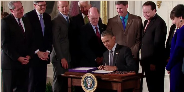 President Obama Signs Two Bills Into Law to Rewrite the Rules of Global Trade